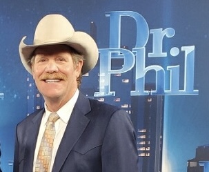 Photo of J. Patrick Johnson, MD, on the set of the Dr. Phil Show.