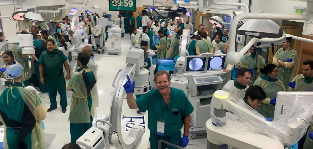 Dr. J. Patrick Johnson waving to the camera at the 15th Annual SSF Spine Residents & Fellows Course.